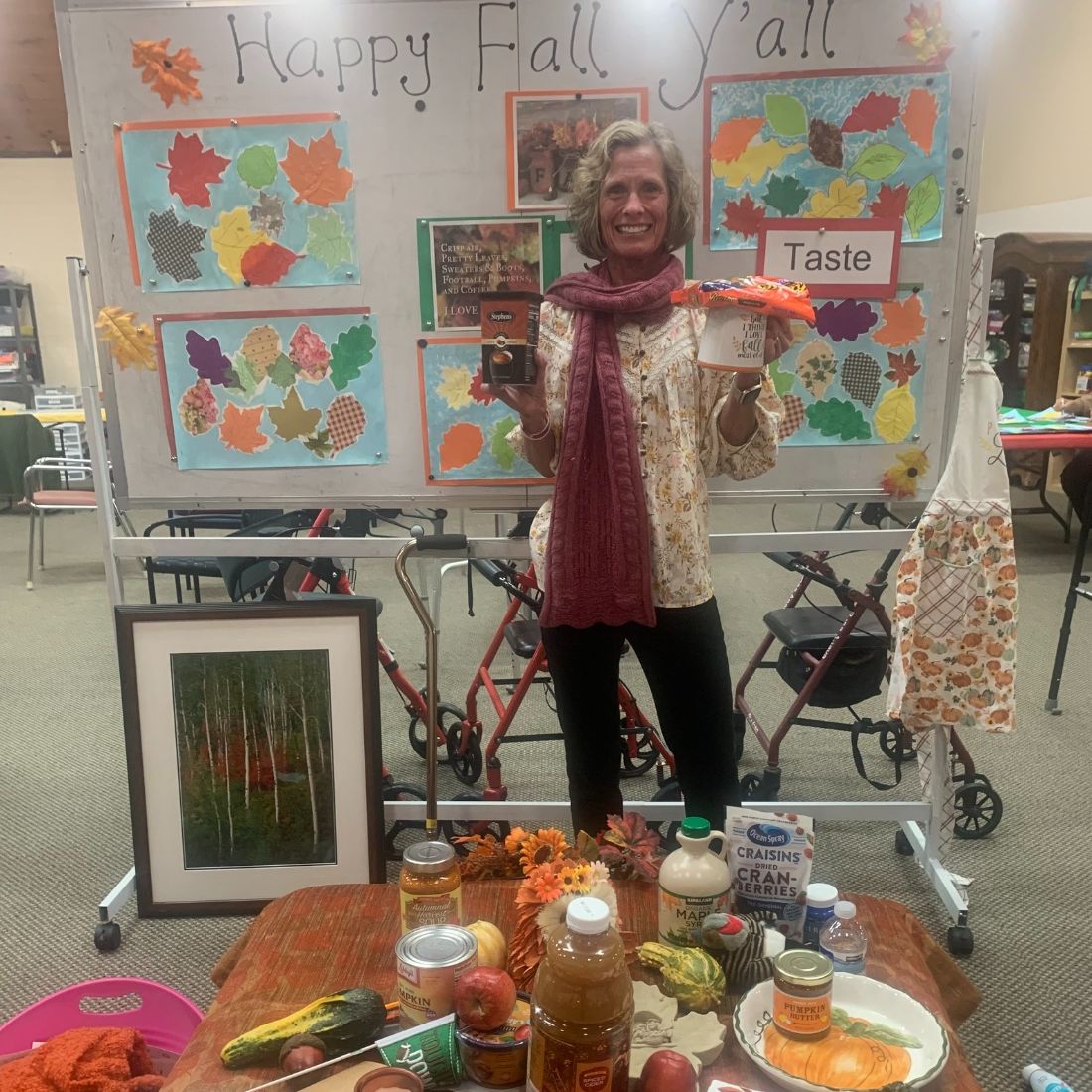 Julie at a fall tasting day, with seasonal food on the table