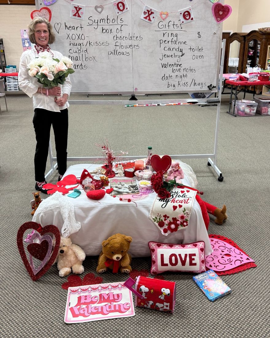 Valentine's Day table with flowers and hearts
